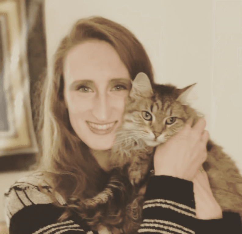 Sara holding a cat.